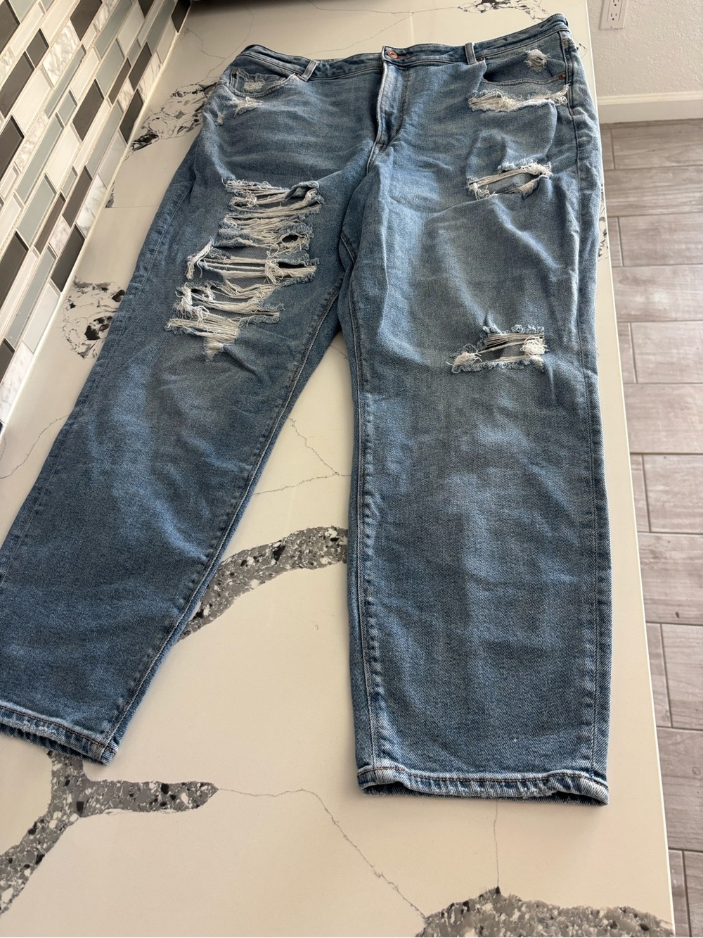 American Eagle stretch mom Jean size 20 inseam is 27 inches